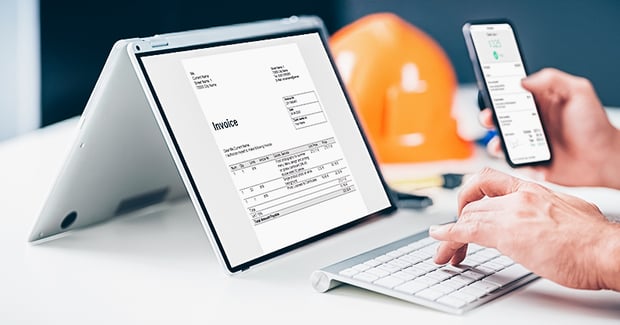 An equipment rental executive creating a consolidated invoice using equipment rental ERP