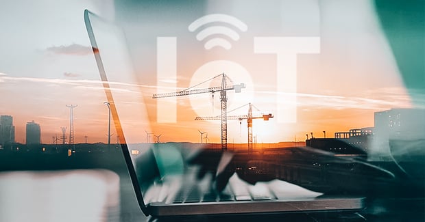 A crane operator using IoT in equipment rental ERP to log in usage hours