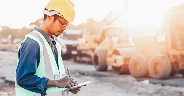 A field service executive using equipment rental ERP to streamline rental maintenance